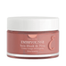 Crème de teint éclat Embryolisse en pot rose avec couvercle blanc, conçue pour hydrater et éclaircir la peau pour un fini lumineux.