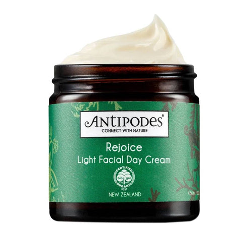 Open jar of Antipodes Rejoice Facial Cream showing creamy texture, natural day moisturizer for face and neck from eSkinStore.