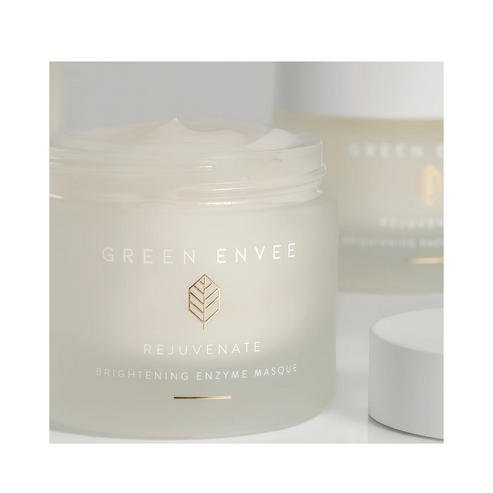 Creamy texture of Green Envee Rejuvenate Brightening Enzyme Face Mask in open jar. Enzyme-rich formula for skin glow and renewal.