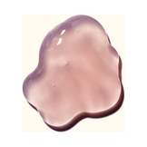 Close-up of Amika Reset Clarifying Gel Shampoo texture, showcasing its translucent pink gel formula for deep scalp cleansing.