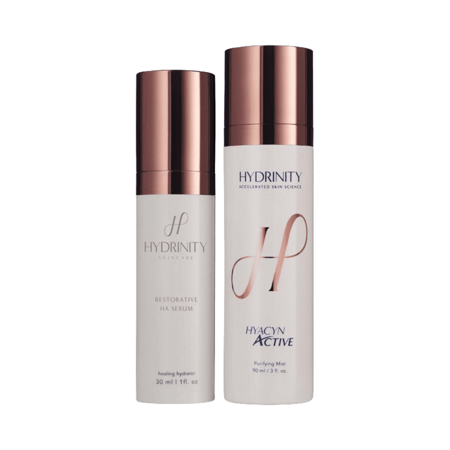 eSkinStore Hydrinity Restorative Duo featuring Restorative HA Serum and Hyacyn Active Purifying Mist with rose gold caps for face and neck care.