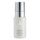 CosMedix Revert Serum - Brightening Boosting face serum in sleek white bottle with silver pump, ideal for reducing age spots and dull skin.