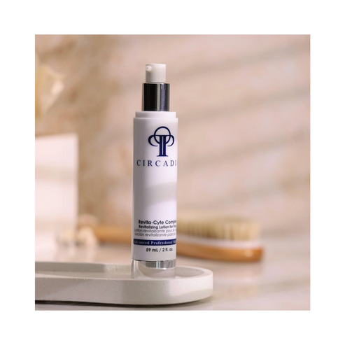 Buy the best anti-aging complex online with Circadia Revita-Cyte Complex, shown on a bathroom counter for daily skincare routines.