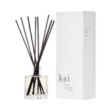 Kai Rose Diffuser - Elegant Aroma Enhancer with sleek black reeds in a clear glass bottle, paired with minimalist white packaging for home fragrance.