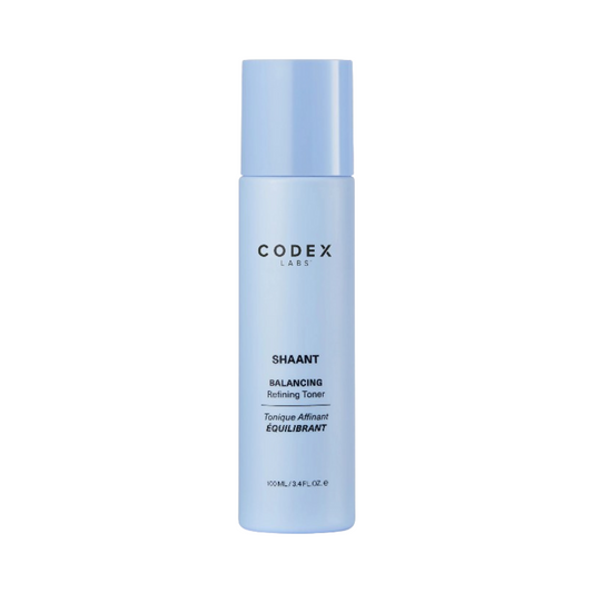 Codex Shaant Balancing Refining Toner i en elegant blå 100 ml flaske, ideell for å fukte huden, redusere rødhet og forfine porene med PHA.