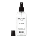 BALMAIN Hair Silk Perfume 200ml in clear bottle with black spray nozzle, ideal for shine, heat protection and hair repair with argan and jojoba oils.