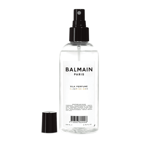 BALMAIN Hair Silk Perfume 200ml in clear bottle with black spray nozzle, ideal for shine, heat protection and hair repair with argan and jojoba oils.