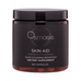 El suplemento dietético Osmosis Professional Skin Aid en frasco de color ámbar oscuro apoya la claridad de la piel y la salud intestinal con ingredientes naturales como Triphala.