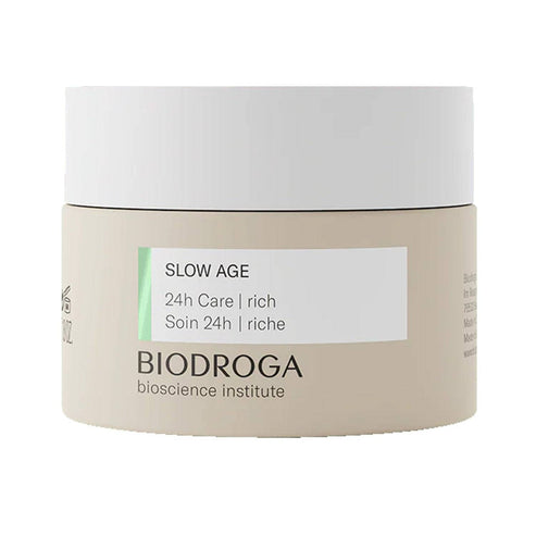 Biodroga Slow Age 24h Care - Rich face cream in beige jar with white lid, ideal for revitalizing and moisturizing aging skin.