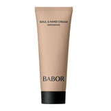 Babor Hand Cream Grounding in beige tube with black text, ideal for nourishing hands and nails with a silky finish.