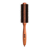Evo Bristle Radial Brush featuring wooden handle and mixed bristles. Perfect for styling and smoothing medium-length hair.