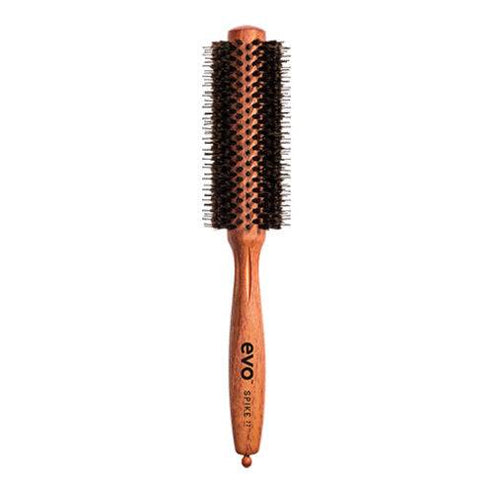 Evo Bristle Radial Brush featuring wooden handle and mixed bristles. Perfect for styling and smoothing medium-length hair.