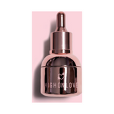High on Love Stimulating Sensual Oil Body Oil in a metallic rose gold dropper bottle, designed for luxurious and intimate body care experiences.