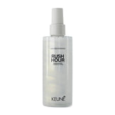 Keune Style Rush Hour Blow-Dry Accelerator in a sleek clear spray bottle. Ideal for quick styling, adds shine and reduces drying time.