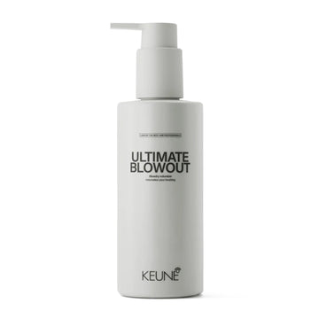 Keune Style Ultimate Blowout hair styling lotion in sleek white pump bottle. Offers medium hold, volume, shine, and heat protection for blowouts.