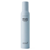 Keune Style Velvet Cloud volumizing foam in sleek light blue bottle, ideal for nourishing and protecting hair with panthenol and Vitamin E.