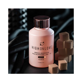 High on Love Sugar High Massage Oil Body Oil 100 ml displayed with sugar cubes on black satin, highlighting its sweet, sensual appeal.