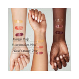 Close-up of Fresh Sugar Lip Treatment tubes with honey and sugar ingredients on a white background