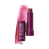 Fresh Sugar Lip Treatment Berry shade with product and swatch, highlighting its hydrating and tinted lip care benefits.