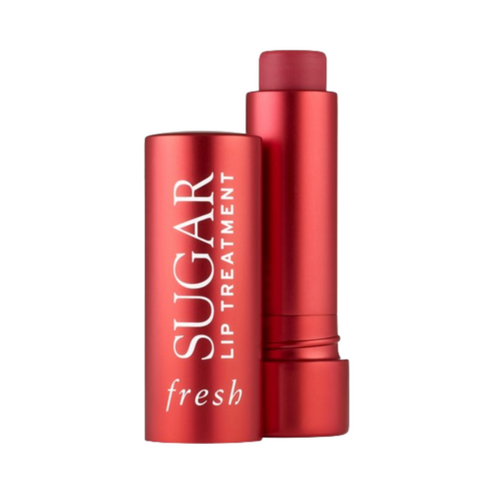 Fresh Sugar Lip Treatment in Coral shade with red tube, providing vibrant tint and long-lasting hydration.