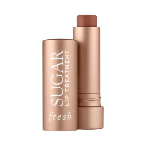 Fresh Sugar Lip Treatment in Honey shade with nude tube, offering subtle tint and 24-hour lip hydration.