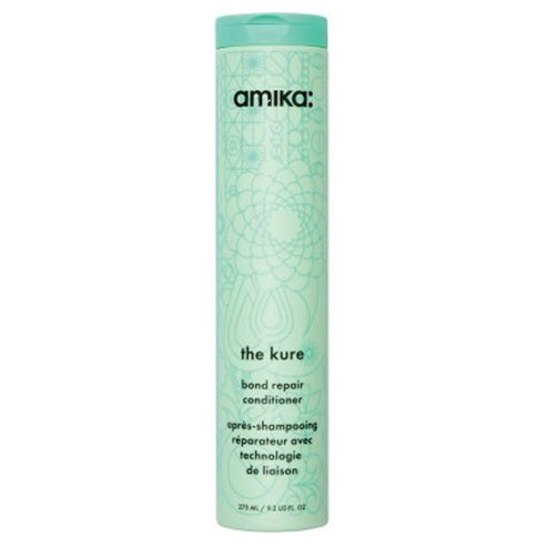 The Kure Bond Repair Conditioner by Amika in a tall mint green bottle with floral design, ideal for repairing and strengthening damaged hair.