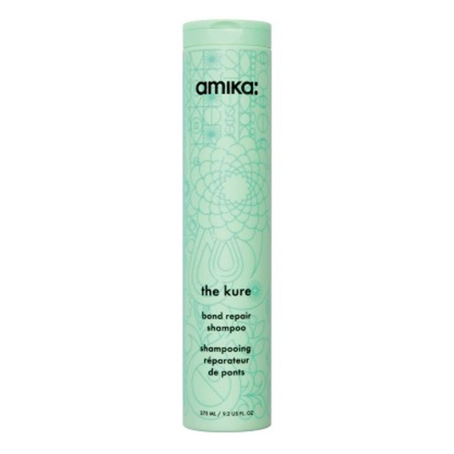 Amika The Kure Shampoo - Bond Repair in mint green bottle, designed for strengthening and repairing damaged hair from heat and chemical treatments.