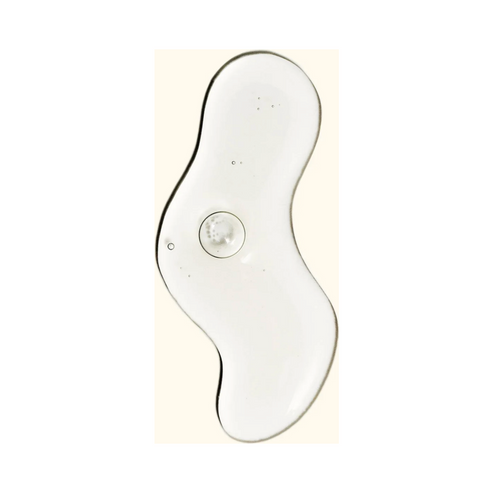 Swatch of Amika The Kure Repair Treatment formula, highlighting its smooth consistency for deep conditioning and hair strengthening.