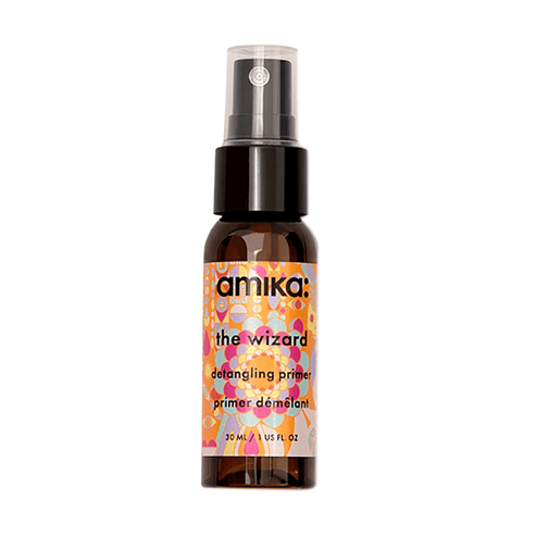 Amika The Wizard Detangling Primer 30 ml mini hair treatment spray with vibrant packaging, perfect for prepping and protecting hair on the go.