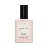 Manucurist Top Coat Sunshine nail polish in a pale pink bottle with black cap, offering high shine and long wear for a gel-effect finish.
