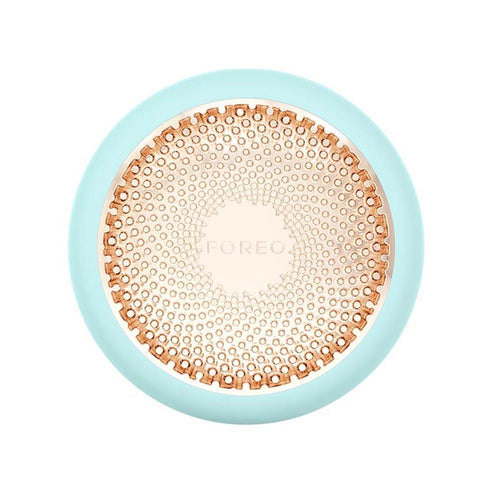 Foreo UFO 3 in mint green with gold LED plate, combining heat, LED, and NIR therapy for youthful, glowing skin.