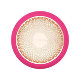 Foreo UFO 3 in vibrant pink with gold LED plate, designed for facial rejuvenation and spa-grade skincare treatments.