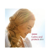 Smiling woman in sunlight with text 'Calms and protects skin,' promoting EltaMD UV Clear SPF 46 for sensitive and acne-prone skin types.