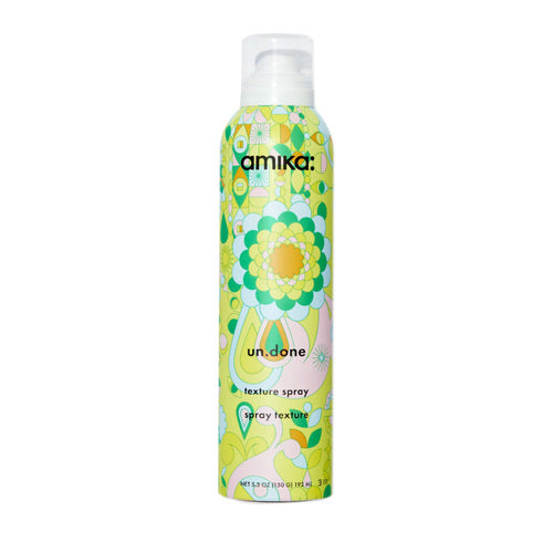 Amika Un.Done Volume Texture Spray 192ml full-size bottle with bold floral print, delivers matte finish and voluminous texture for all hair types.