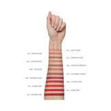Full shade range of Pupa Vamp Lip Pencil swatched on arm, featuring 12 colors from nude to bold red.