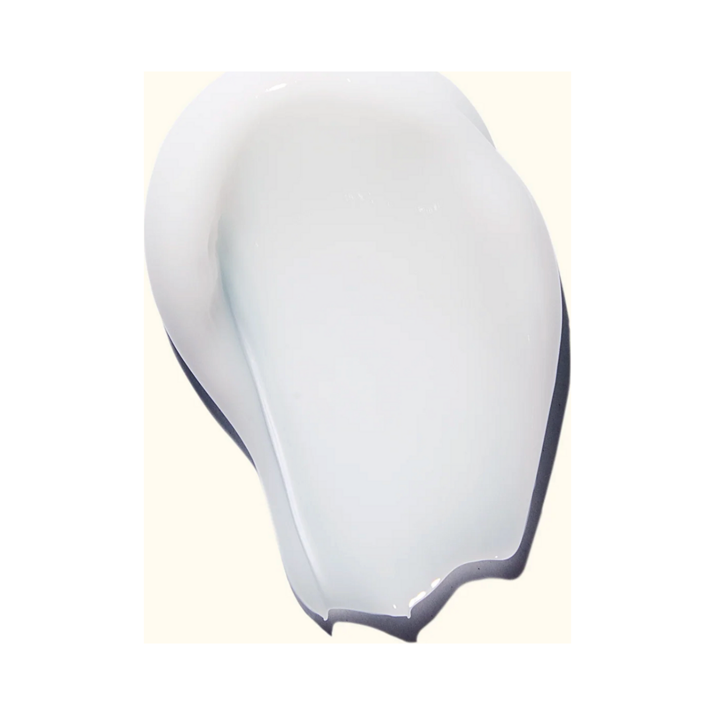 Close-up of Amika Velveteen Dream Smoothing Balm texture, showcasing creamy consistency for frizz-free, smooth hair styling.