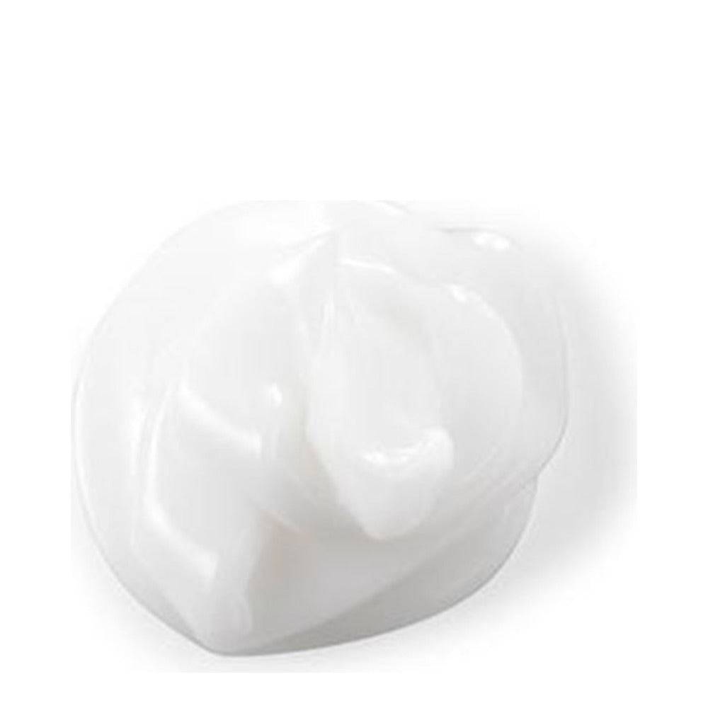 Close-up of creamy white texture of Philip B Botanical Weightless Volumizing Conditioner, ideal for hydrating and detangling hair.