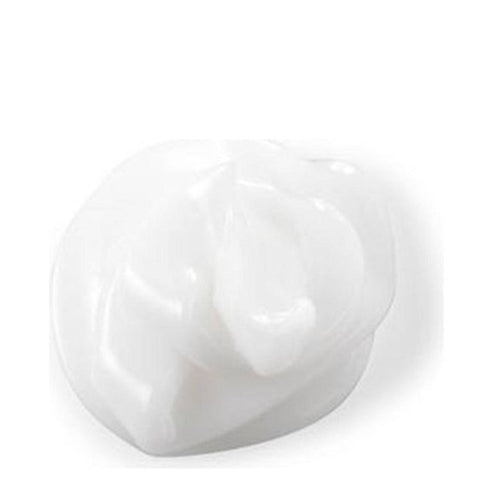 Close-up of creamy white texture of Philip B Botanical Weightless Volumizing Conditioner, ideal for hydrating and detangling hair.